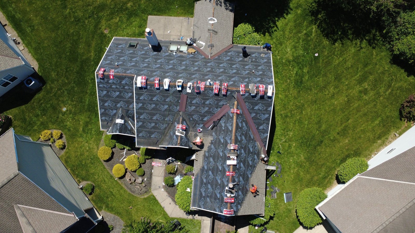 Aerial drone view of a completed roof replacement in Middleburg Heights, Ohio (Cuyahoga County) by Firestone Roofing & Restoration.
