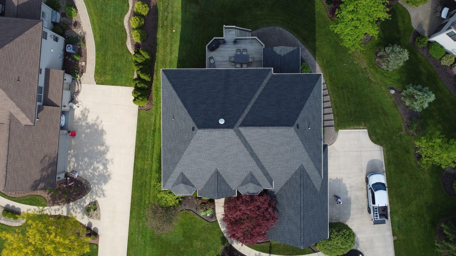 Drone photo of a finished shingle roof on a North Royalton home in Cuyahoga County, Northeast Ohio — Firestone Roofing & Restoration.