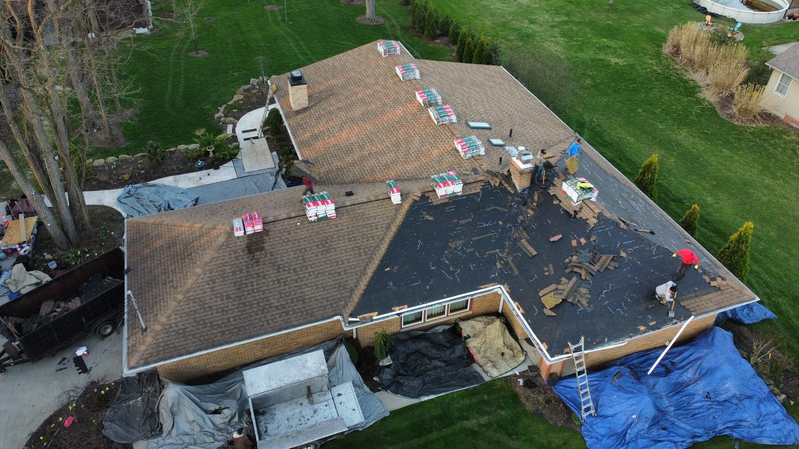 Aerial drone view of a completed roof replacement in Brunswick, Ohio (Medina County) by Firestone Roofing & Restoration.