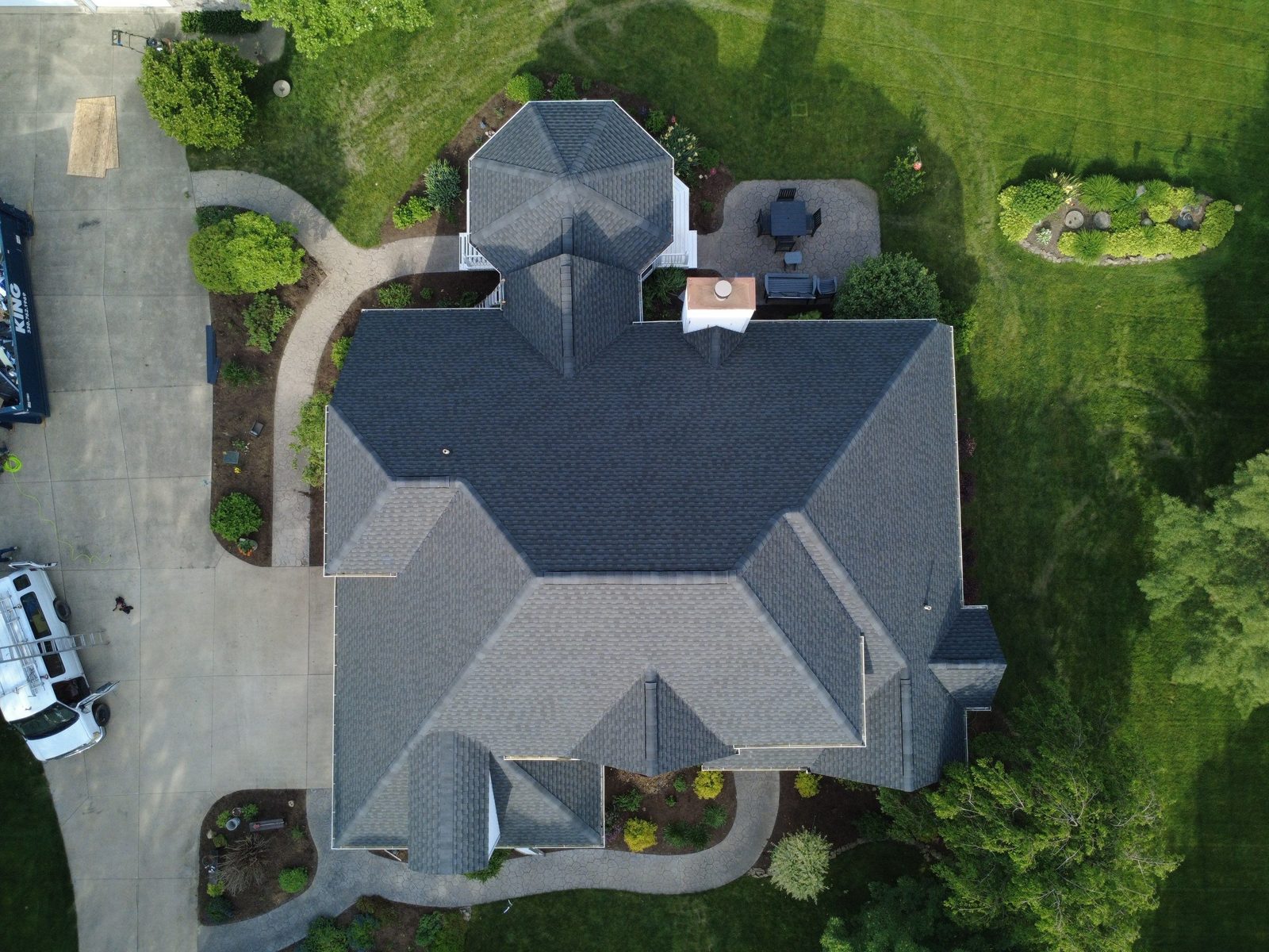 Top-down drone shot of a newly installed roof in Seville (Medina County, Northeast Ohio), by Firestone Roofing & Restoration.