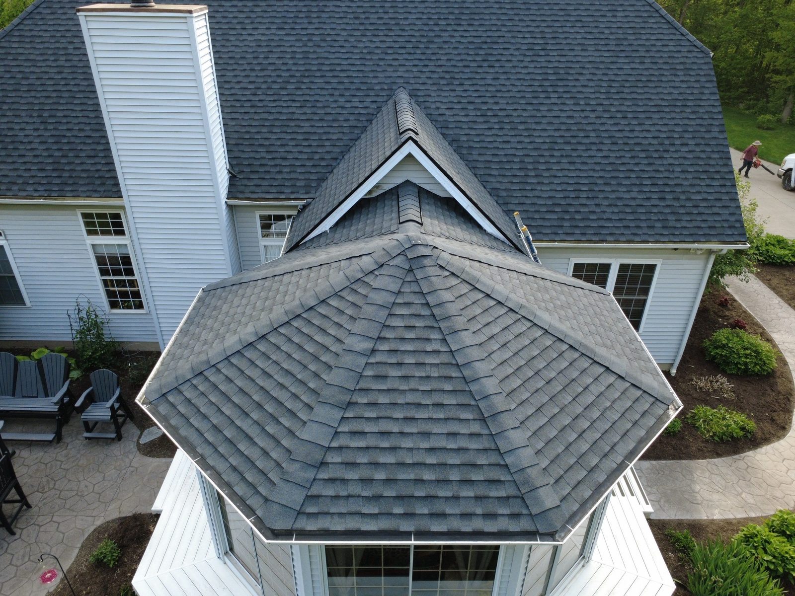 Aerial drone view of a completed roof replacement in Seville, Ohio (Medina County) by Firestone Roofing & Restoration.