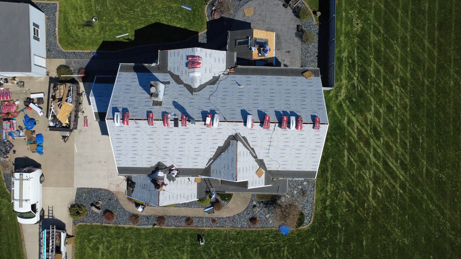 Drone photo of a finished shingle roof on a Seville home in Medina County, Northeast Ohio — Firestone Roofing & Restoration.