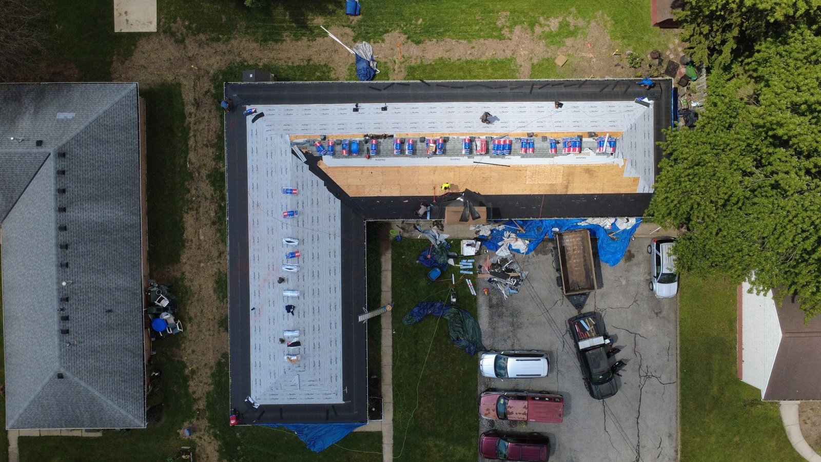 Drone photo of a finished shingle roof on a Parma Heights home in Cuyahoga County, Northeast Ohio — Firestone Roofing & Restoration.