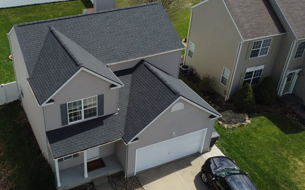 Drone photo of a finished shingle roof on a Wadsworth home in Medina County, Northeast Ohio. Firestone Roofing & Restoration.